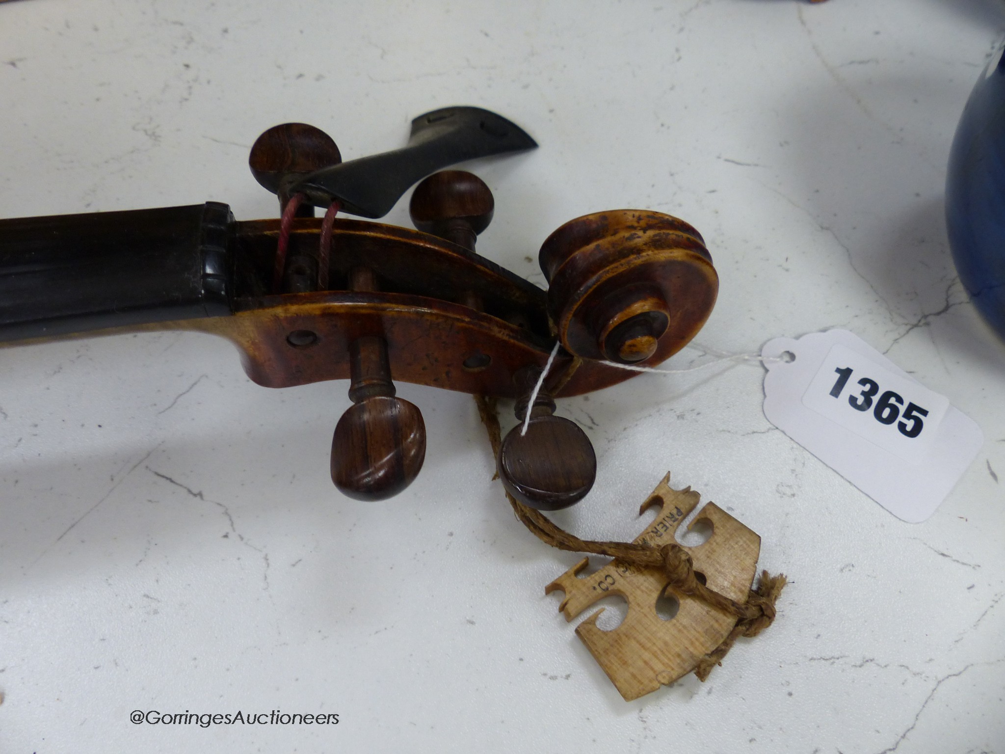 A Lowendall violin, labelled Stradivarius, 58cm long, together with a bow